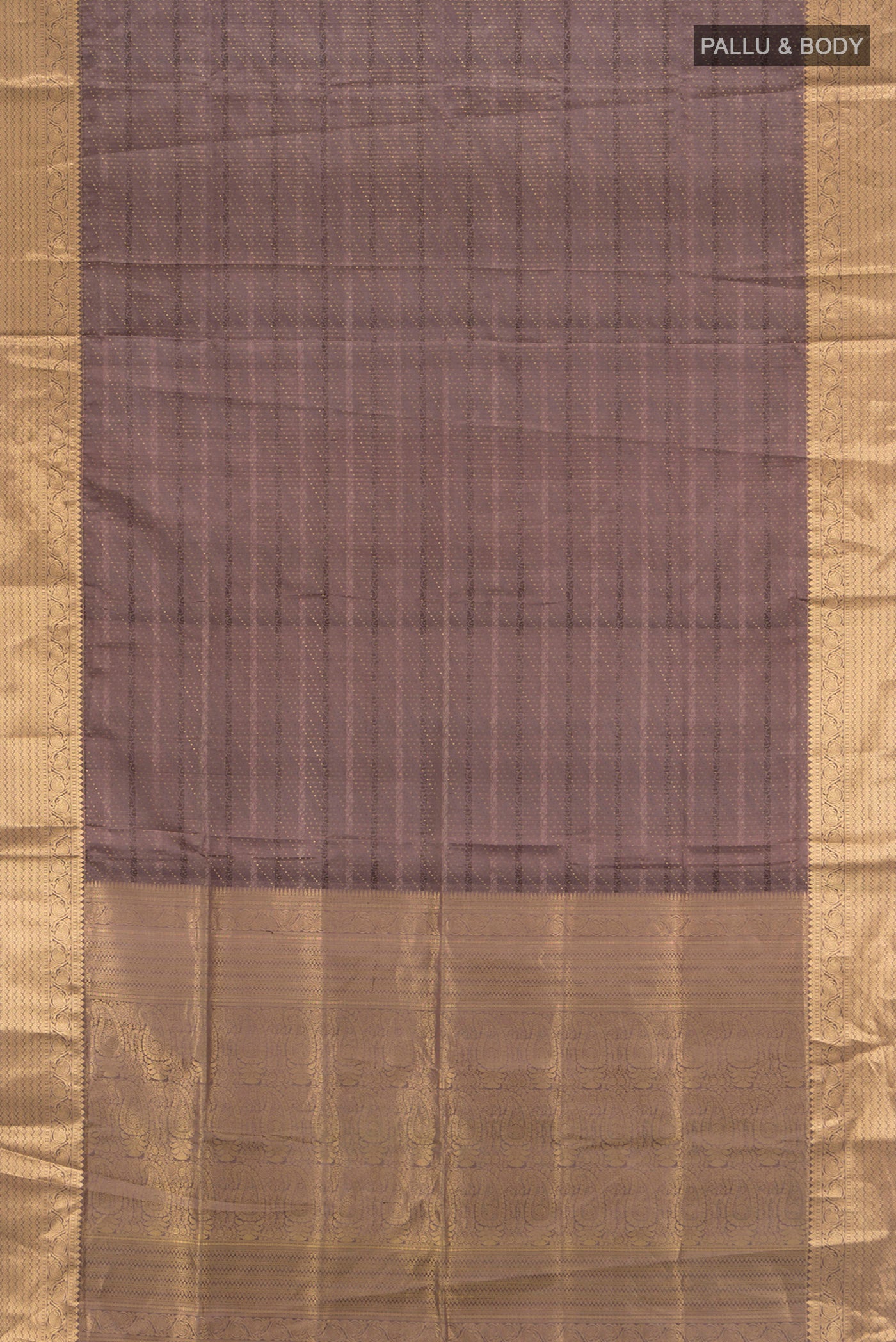 Flat view of Brown Soft Silk Saree with Jacquard With Zari Butta on the body and Zari Border. 