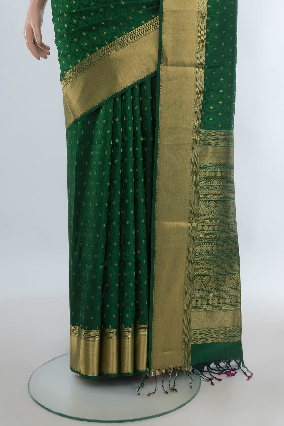 Pleats and pallu of Pure Silk Green Soft Saree with Jacquard With Zari Butta on the body and Zari Border. 