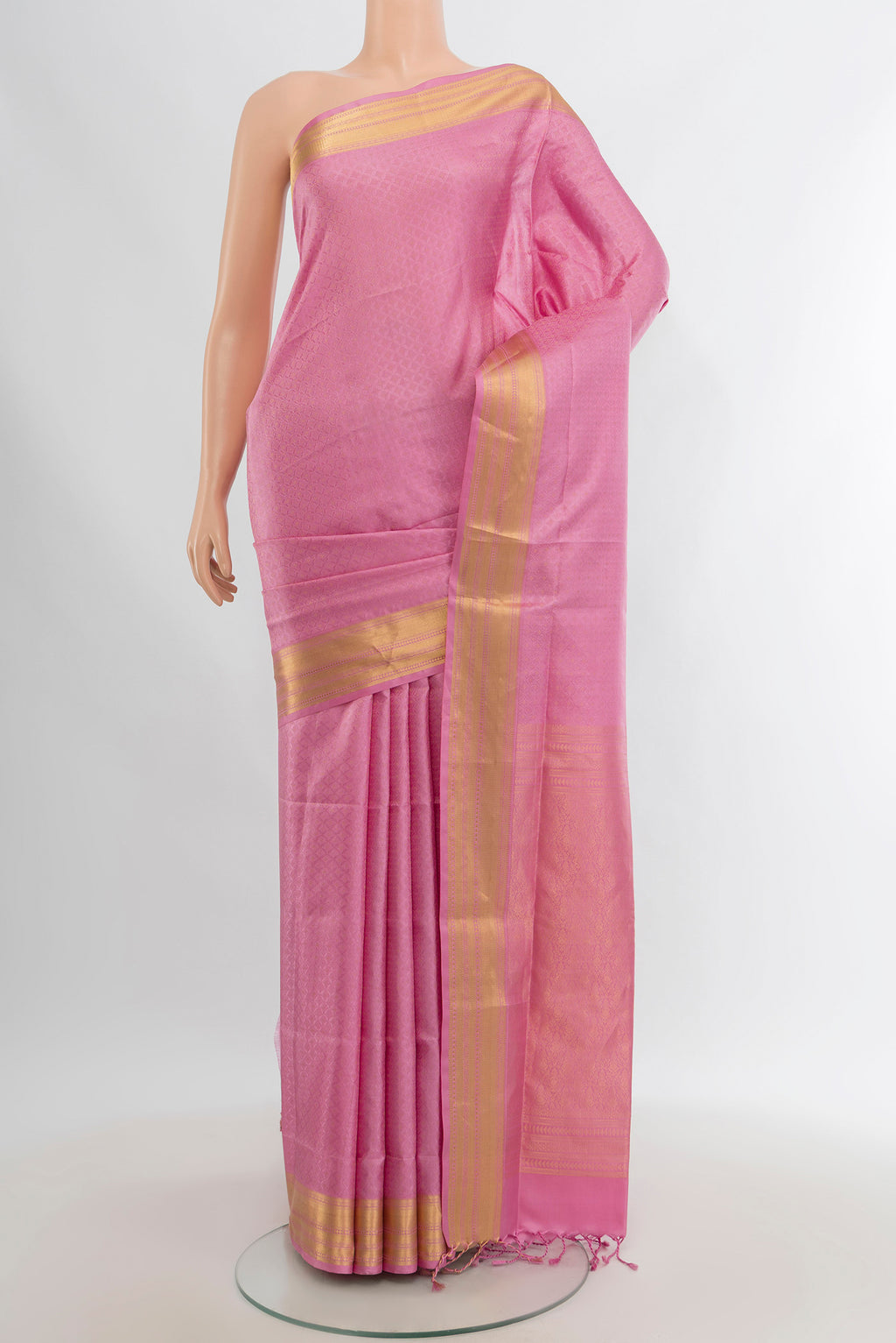 Rose pink Soft Silk Saree with Jacquard design on the body and Zari Border.  displayed on a mannequin