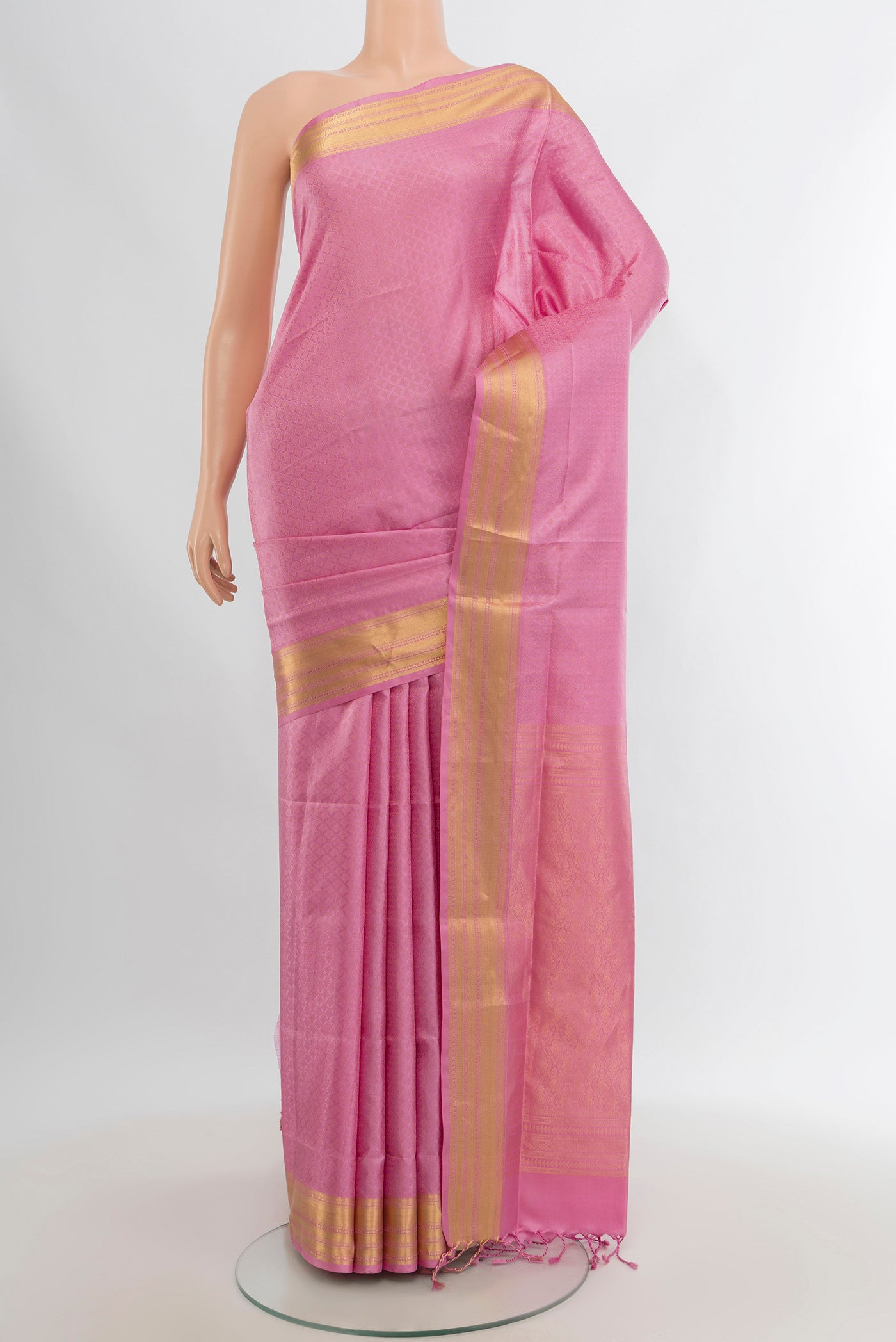 Rose pink Soft Silk Saree with Jacquard design on the body and Zari Border.  displayed on a mannequin