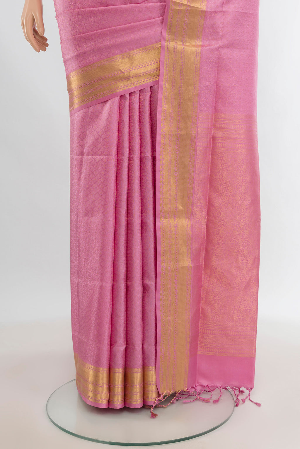 Pleats and pallu of Rose pink Soft Silk Saree with Jacquard design on the body and Zari Border. 