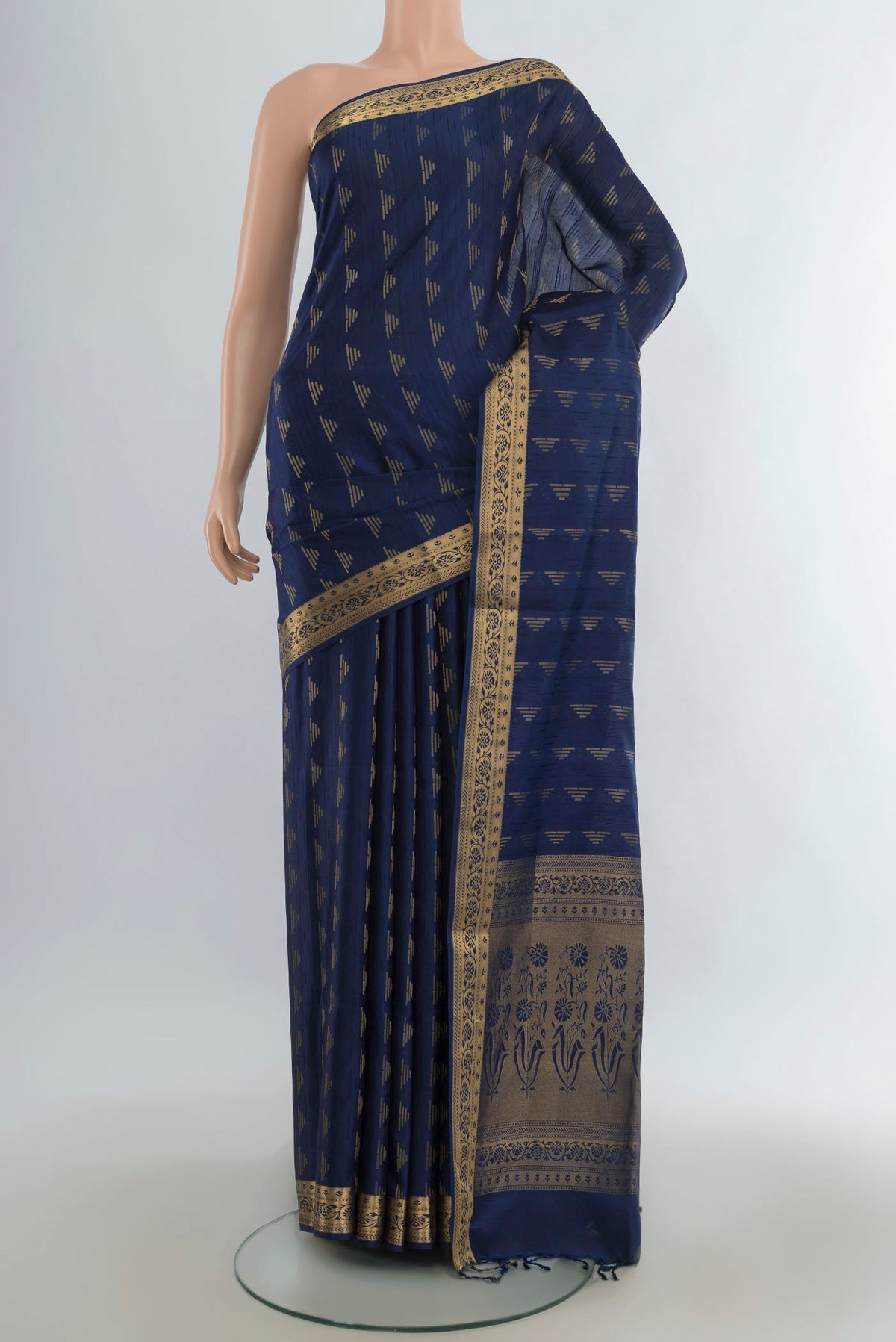 Pure Silk Navy Blue Soft Saree with Jacquard With Zari Butta on the body and Zari Border.  displayed on a mannequin