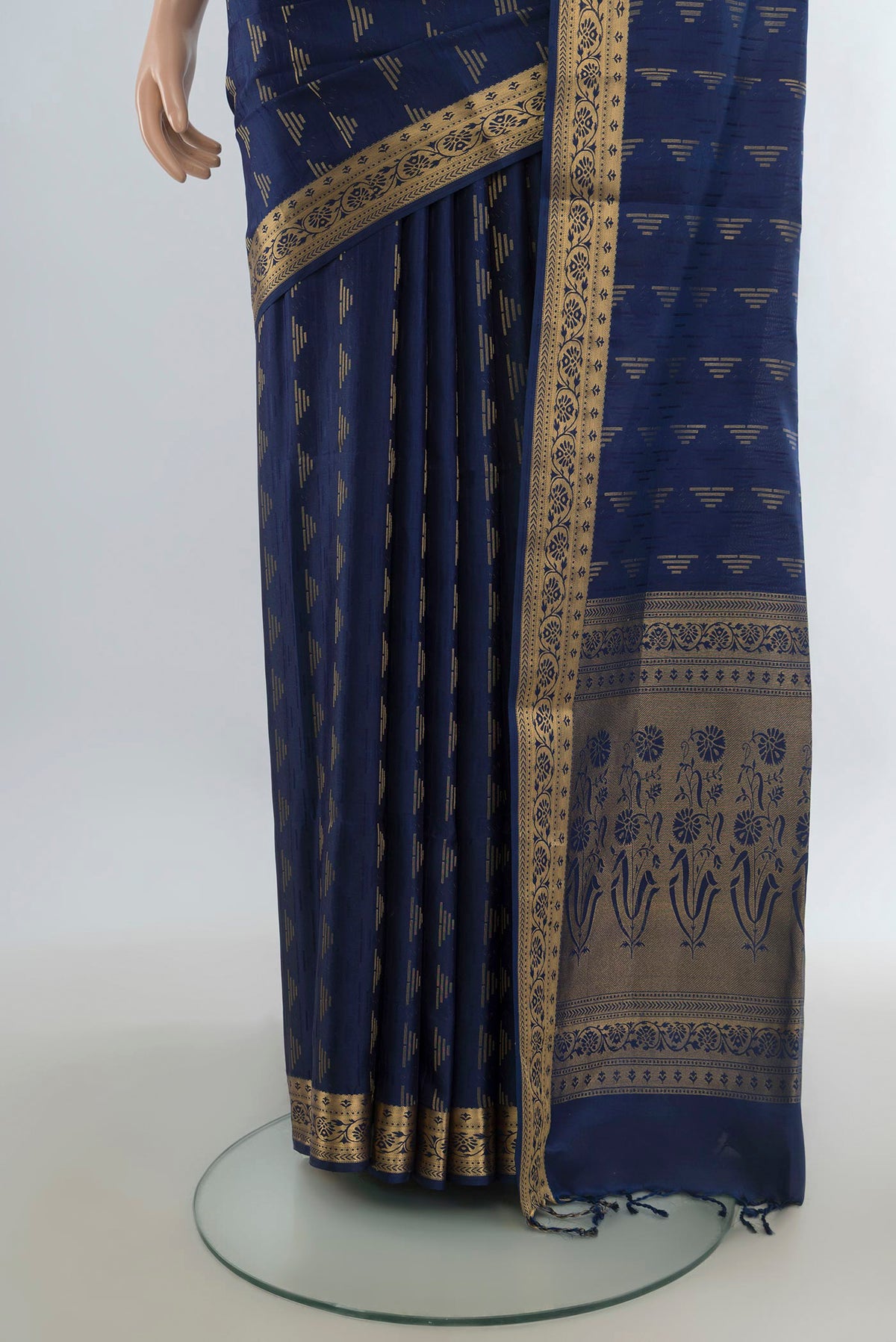 Pleats and pallu of Pure Silk Navy Blue Soft Saree with Jacquard With Zari Butta on the body and Zari Border. 