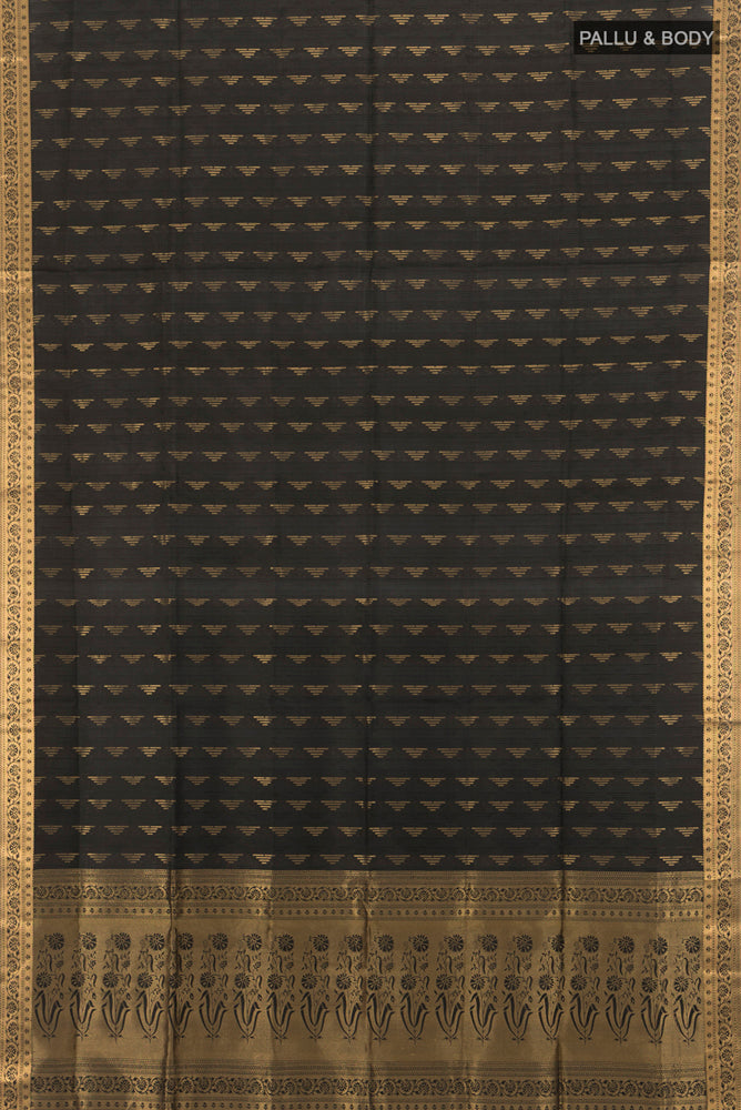 Flat view of Black Soft Silk Saree with Zari Butta on the body and Silk Border. 