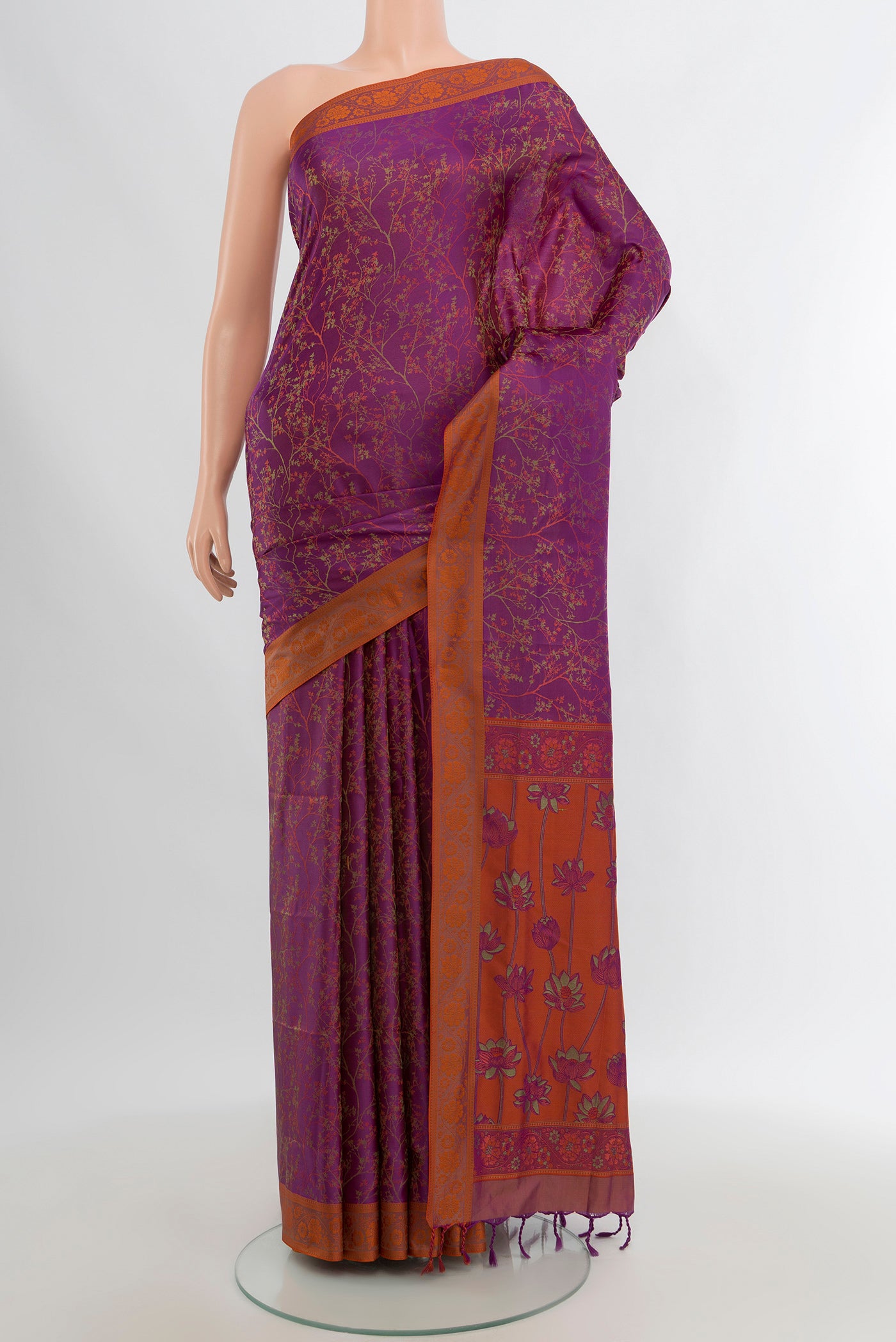 Purple Soft Silk Saree with Jacquard design on the body and Thread Border.  displayed on a mannequin