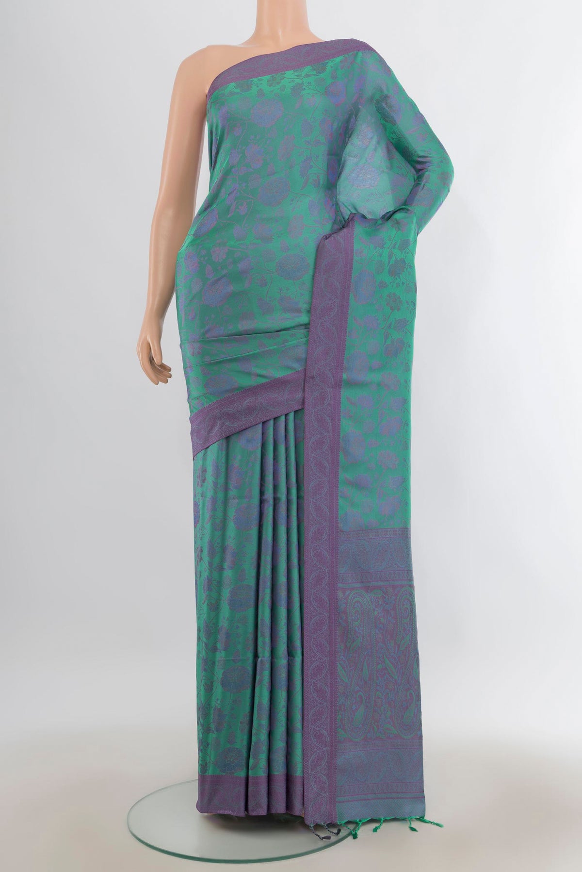 Pure Silk Sea Green Soft Saree with Jacquard design on the body and Thread Border.  displayed on a mannequin