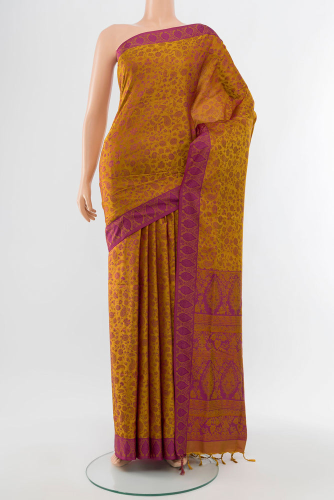 Multi Color Soft Silk Saree with Jacquard With Thread Butta on the body and Silk Border.  displayed on a mannequin