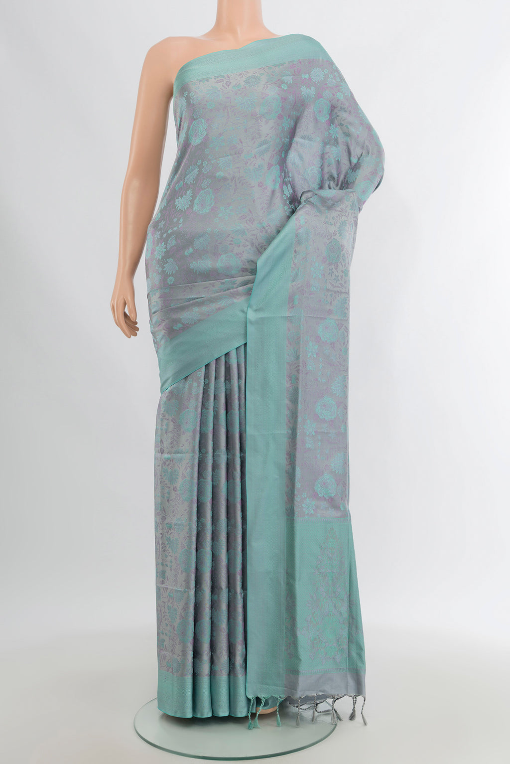 Grey Soft Silk Saree with Jacquard design on the body and Thread Border.  displayed on a mannequin