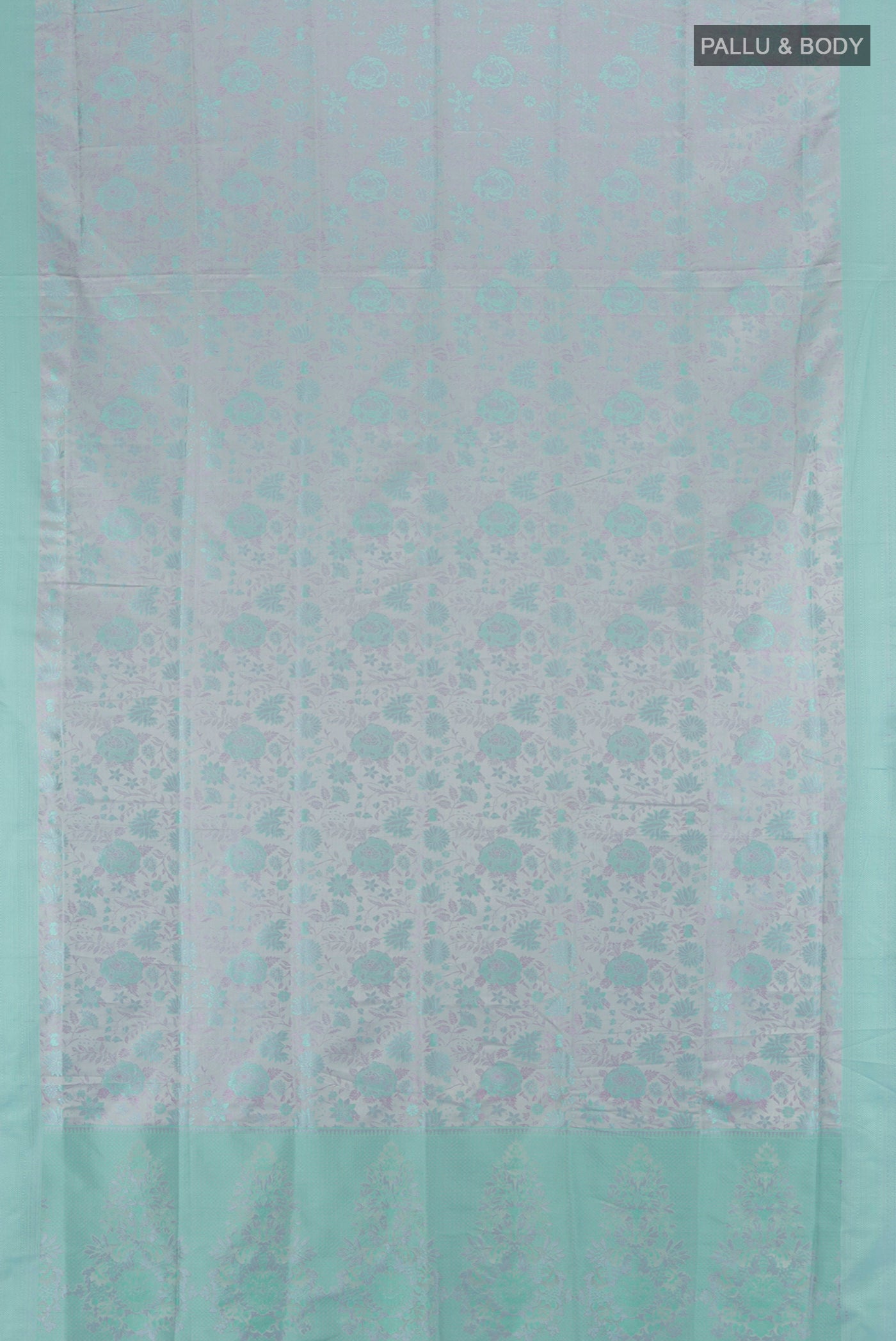Flat view of Grey Soft Silk Saree with Jacquard design on the body and Thread Border. 