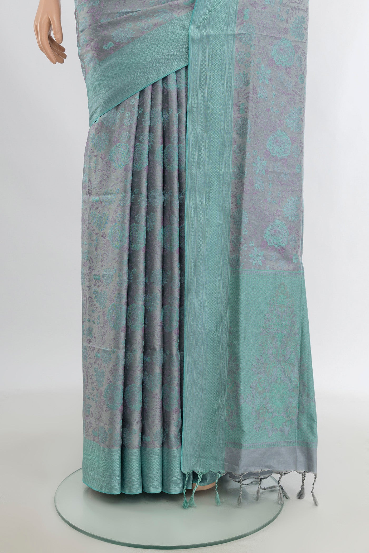 Pleats and pallu of Grey Soft Silk Saree with Jacquard design on the body and Thread Border. 
