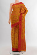 Mustard Soft Silk Saree with Jacquard design on the body and Thread Border.  displayed on a mannequin