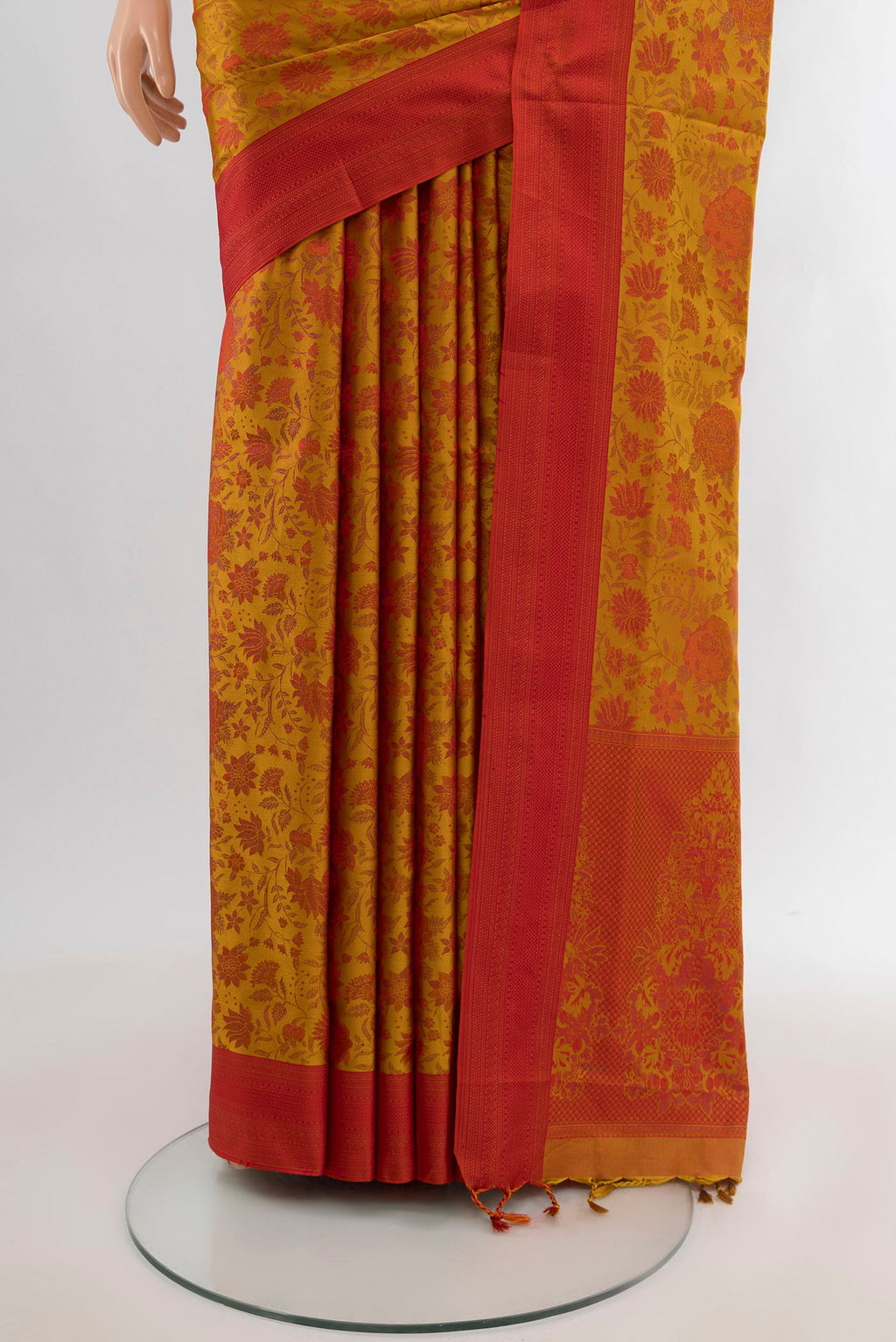 Pleats and pallu of Mustard Soft Silk Saree with Jacquard design on the body and Thread Border. 