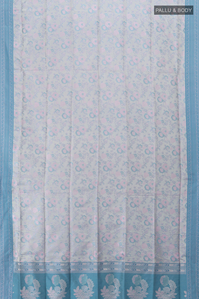 Flat view of Grey Soft Silk Saree with Jacquard With Thread Butta on the body and Silk Border. 