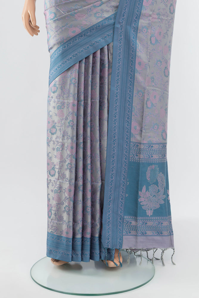 Pleats and pallu of Grey Soft Silk Saree with Jacquard With Thread Butta on the body and Silk Border. 