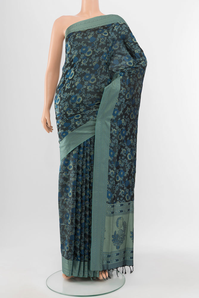 Multi Color Soft Silk Saree with Jacquard With Thread Butta on the body and Silk Border.  displayed on a mannequin