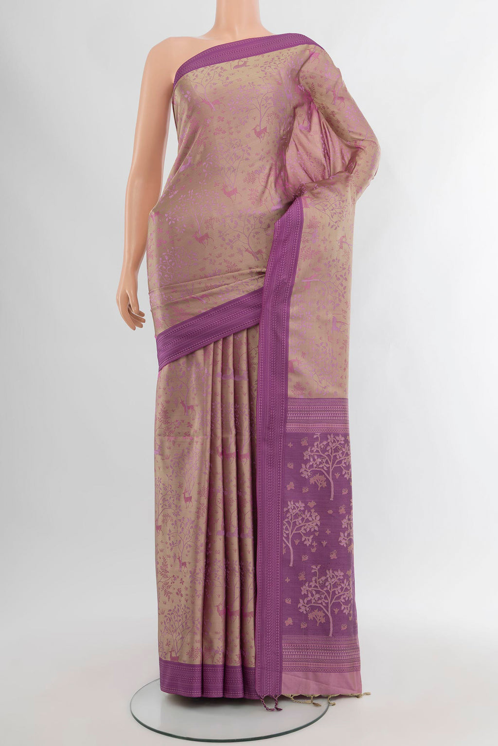 Lavender Soft Silk Saree with Jacquard design on the body and Thread Border.  displayed on a mannequin