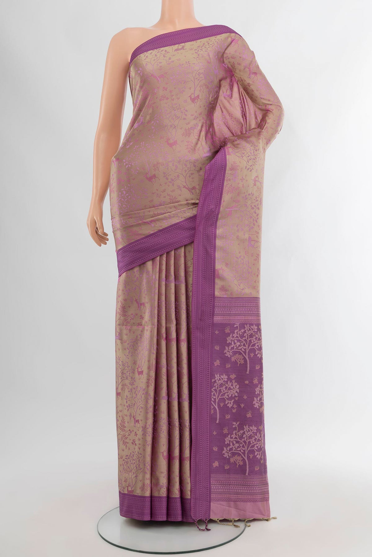 Lavender Soft Silk Saree with Jacquard design on the body and Thread Border.  displayed on a mannequin