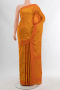 Mustard Soft Silk Saree with Thread Butta on the body and Silk Border.  displayed on a mannequin
