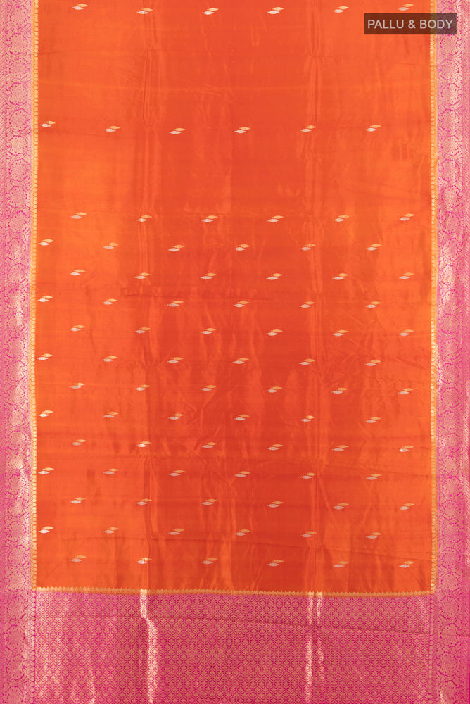 Flat view of Brick Orange Banarasi Katan Silk Saree with Zari Brocade on the body and Silk Border. 