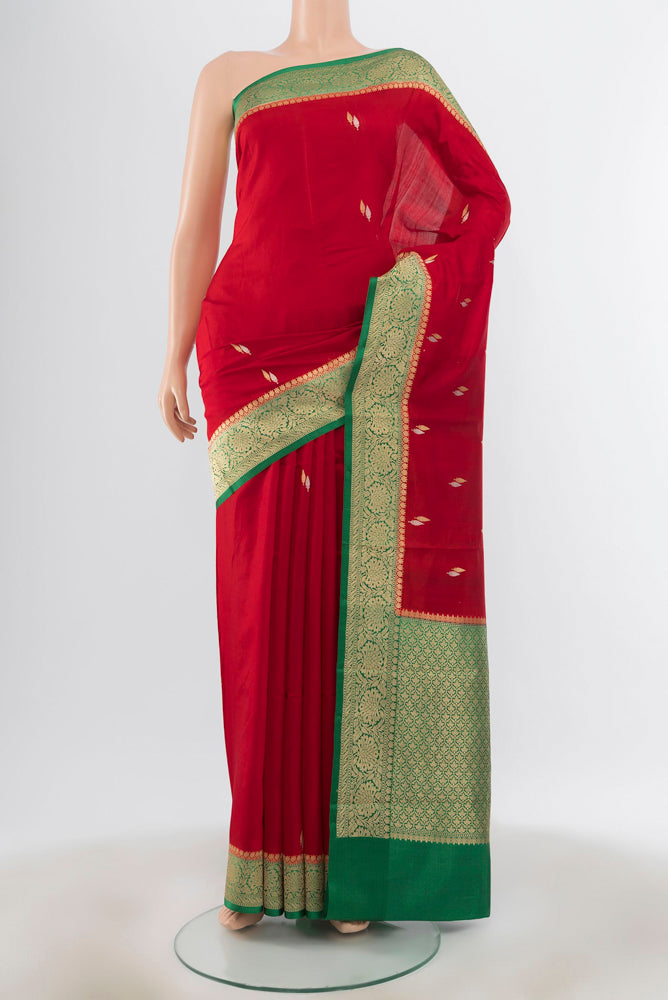 Red Banarasi Katan Silk Saree with Zari Butta on the body and Silk Border.  displayed on a mannequin