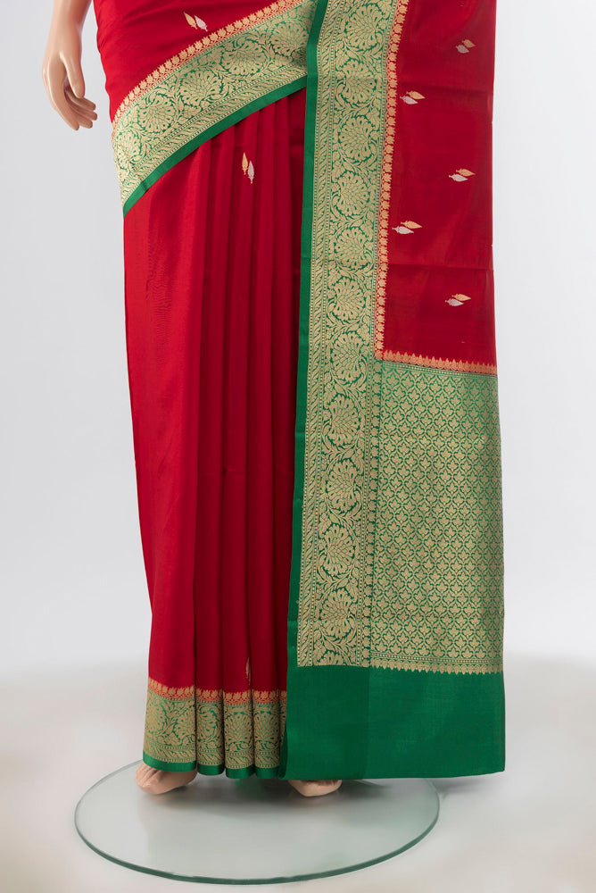 Pleats and pallu of Red Banarasi Katan Silk Saree with Zari Butta on the body and Silk Border. 