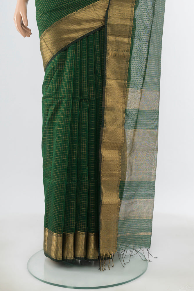 Pleats and pallu of Pure Silk Pure Zari Bottle Green Maheshwari Cotton Saree with Zari Butta on the body and Silk Border. 