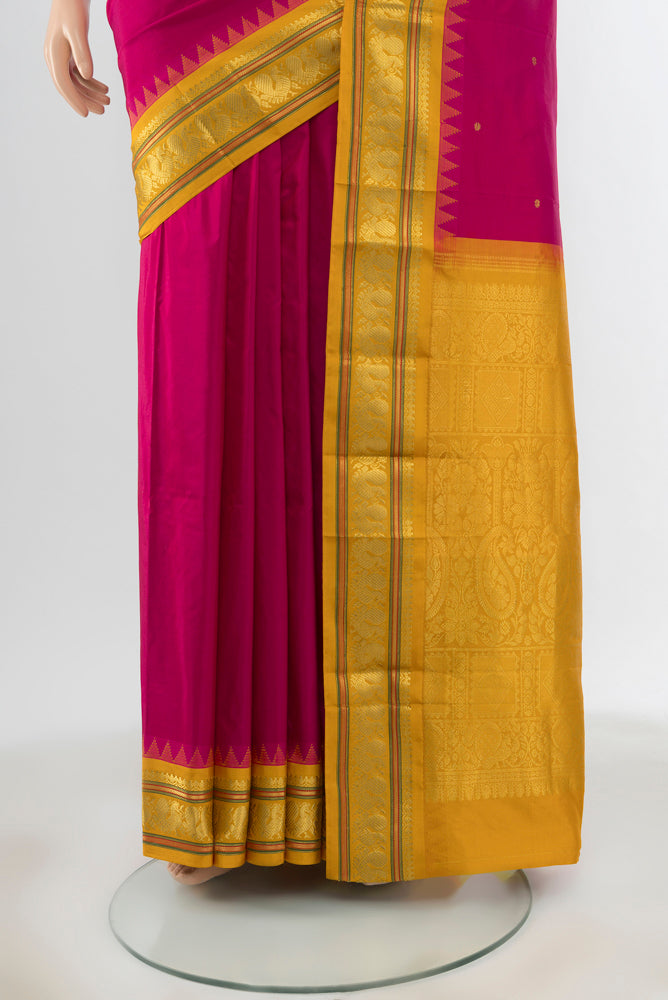 Pleats and pallu of Dark Pink Narayanpet Silk Saree with Zari Butta on the body and Silk Border. 