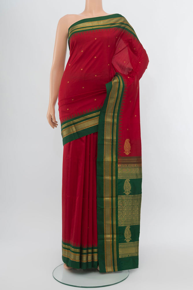 Maroon Narayanpet Silk Saree with Zari Butta on the body and Silk Border.  displayed on a mannequin