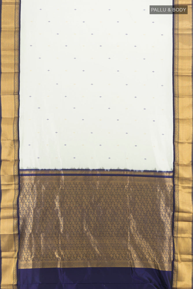 Flat view of Cream Narayanpet Silk Saree with Zari Butta on the body and Silk Border. 
