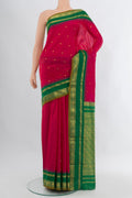 Pink Bangalore Silk Saree with Zari Butta on the body and Zari Border.  displayed on a mannequin