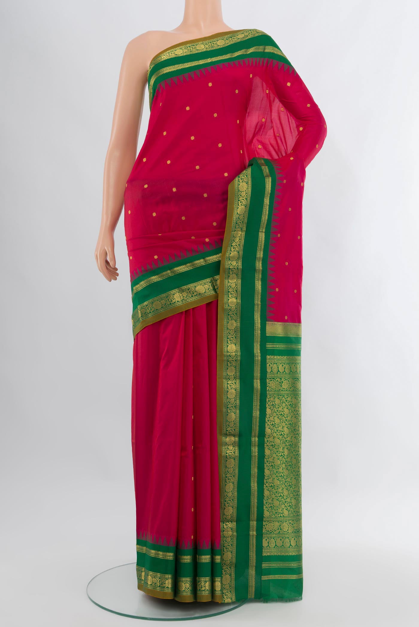 Pink Bangalore Silk Saree with Zari Butta on the body and Zari Border.  displayed on a mannequin