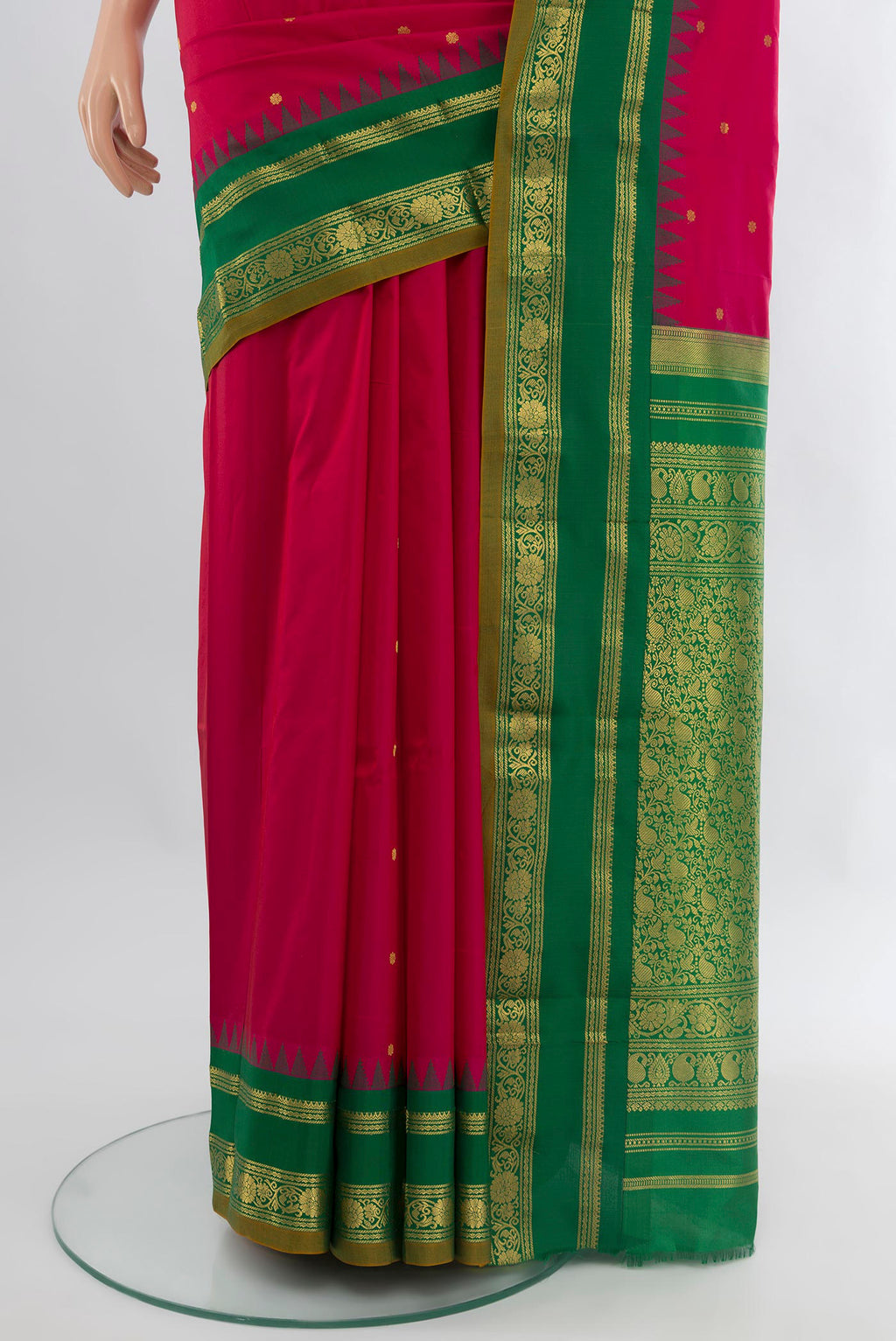 Pleats and pallu of Pink Bangalore Silk Saree with Zari Butta on the body and Zari Border. 