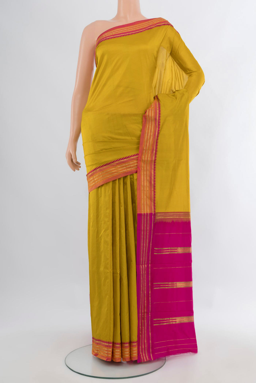 Yellow Narayanpet Silk Saree with Plain Body and Zari Border.  displayed on a mannequin