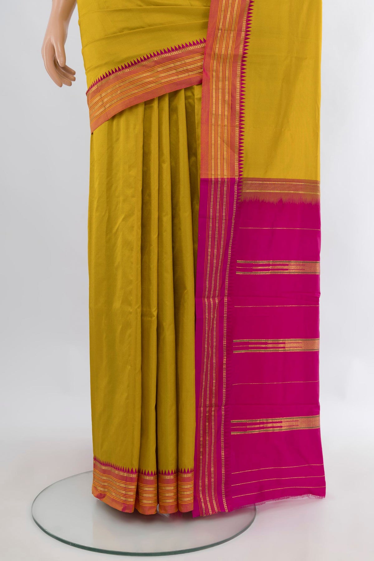 Pleats and pallu of Yellow Narayanpet Silk Saree with Plain Body and Zari Border. 