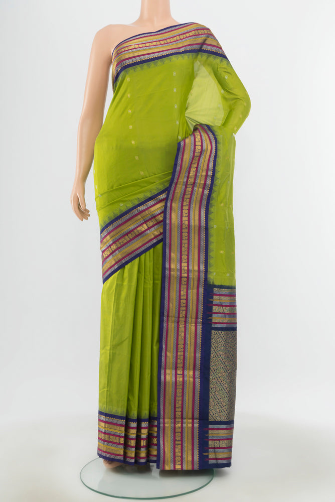 Pure Silk Pure Zari Light Green Bangalore - kadyal Saree with Zari Butta on the body and Silk Border.  displayed on a mannequin