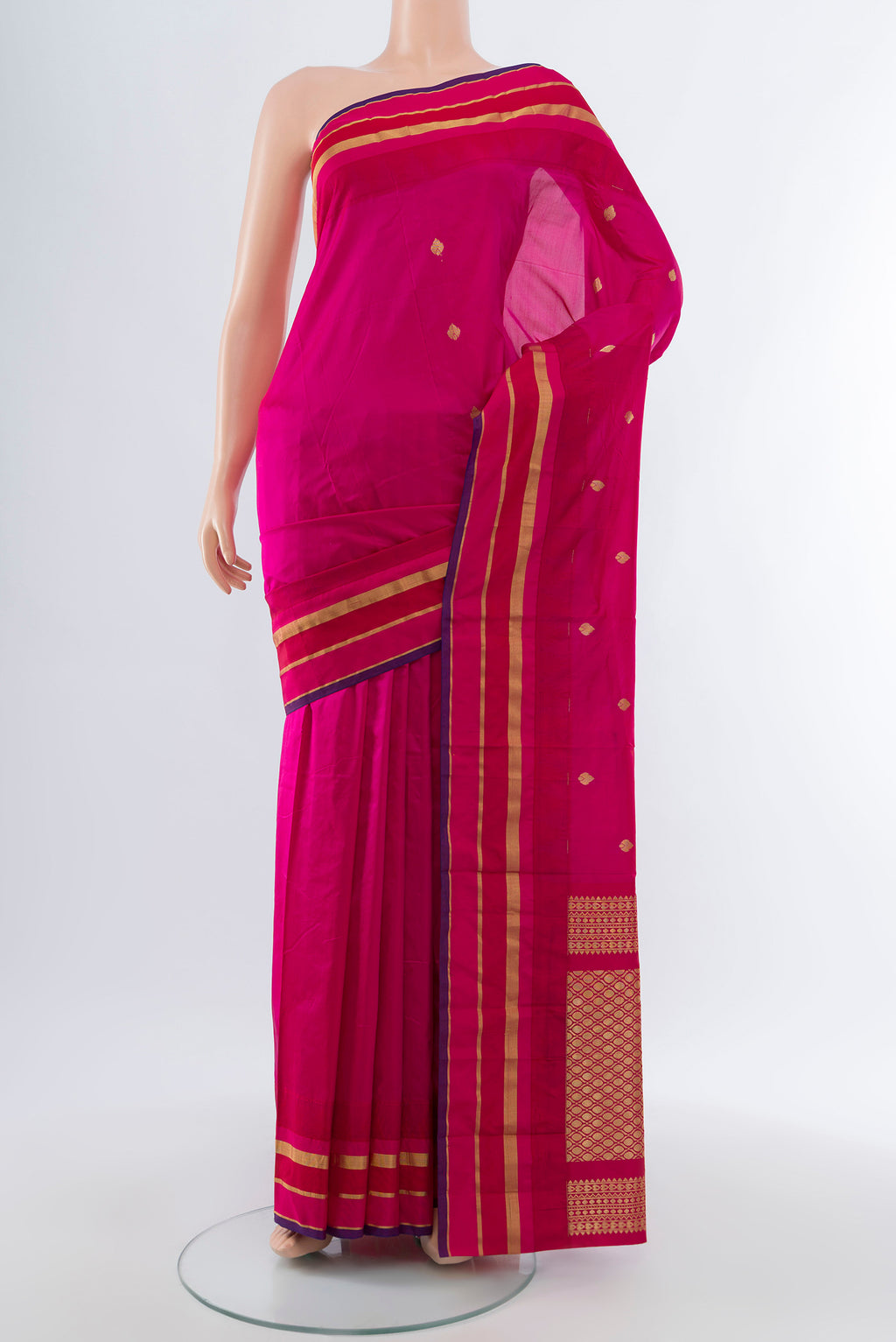 Rani Pink Bangalore Silk Saree with Zari Butta on the body and Silk Border.  displayed on a mannequin