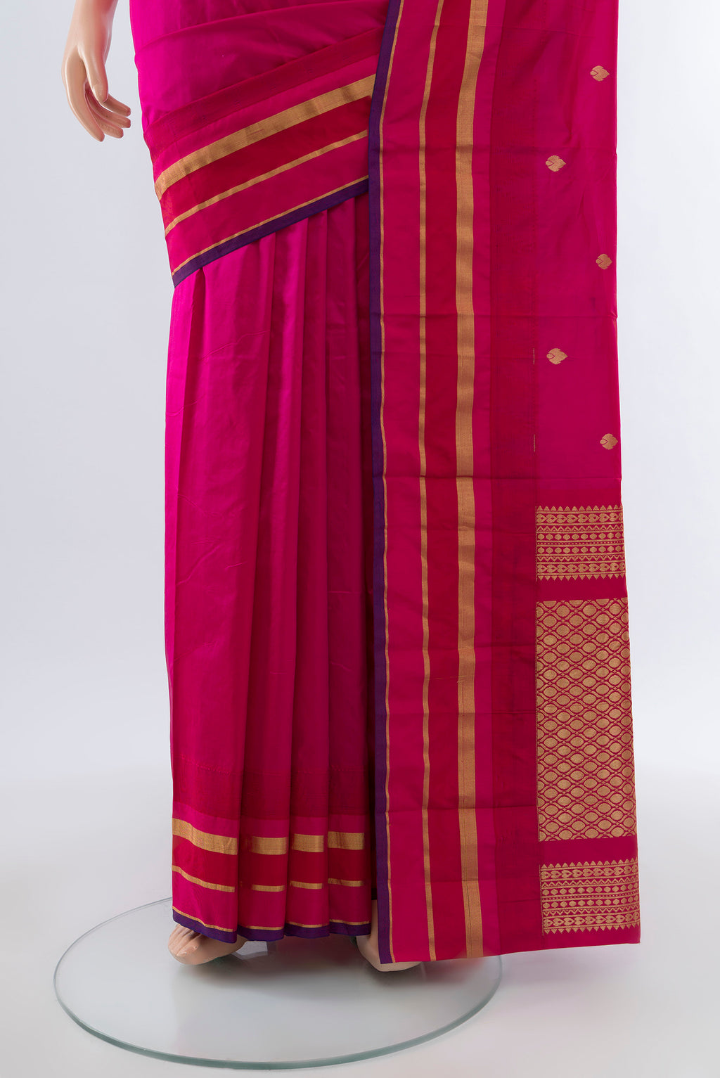 Pleats and pallu of Rani Pink Bangalore Silk Saree with Zari Butta on the body and Silk Border. 