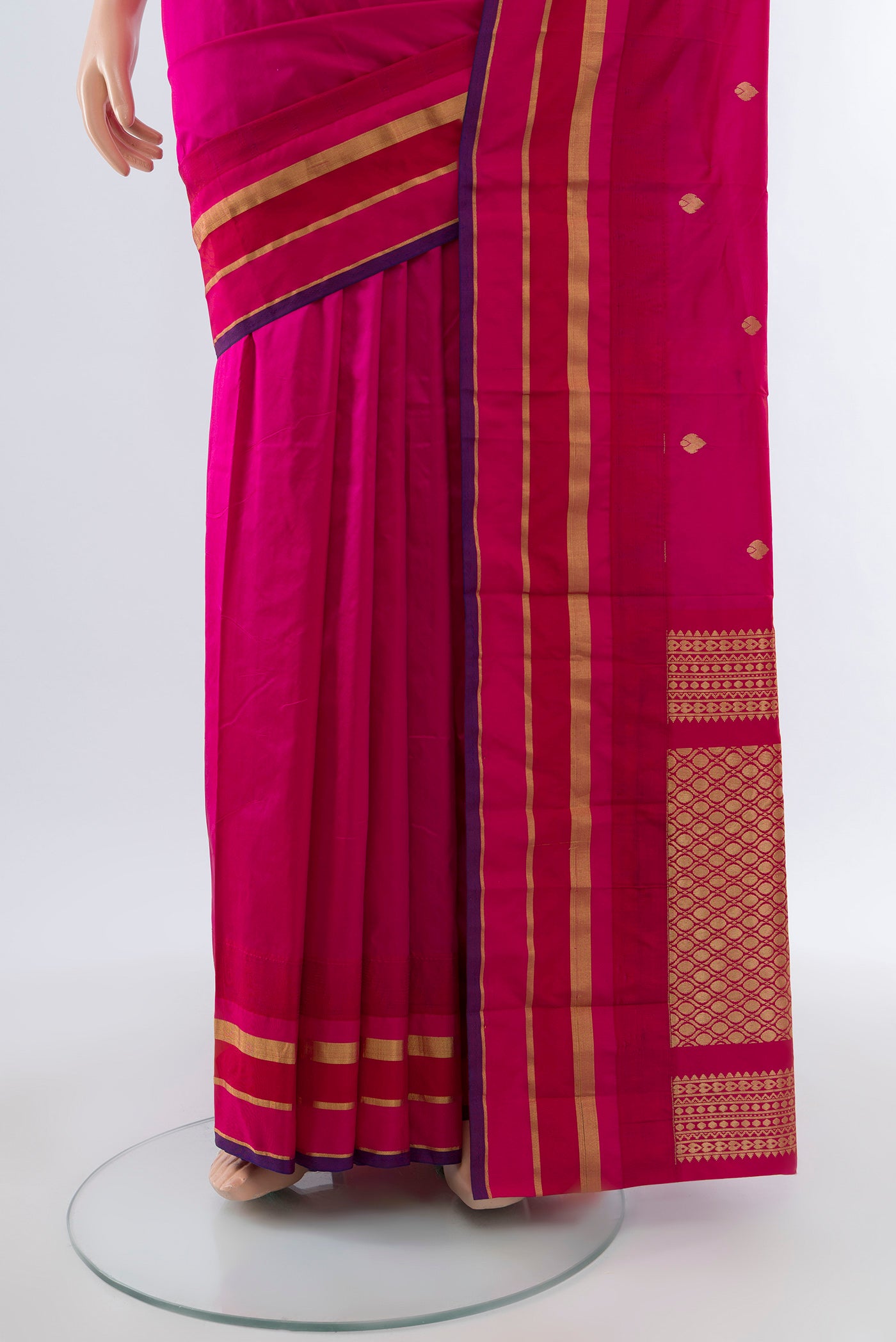 Pleats and pallu of Rani Pink Bangalore Silk Saree with Zari Butta on the body and Silk Border. 