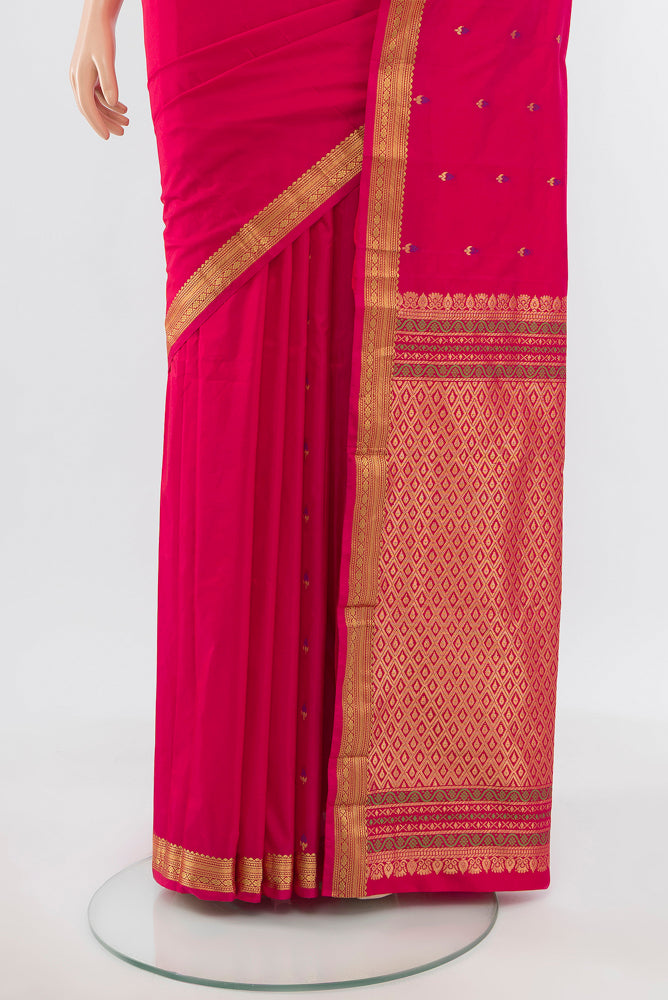 Pleats and pallu of Pure Silk Pure Zari Rani Pink Bangalore Saree with Zari Brocade on the body and Silk Border. 