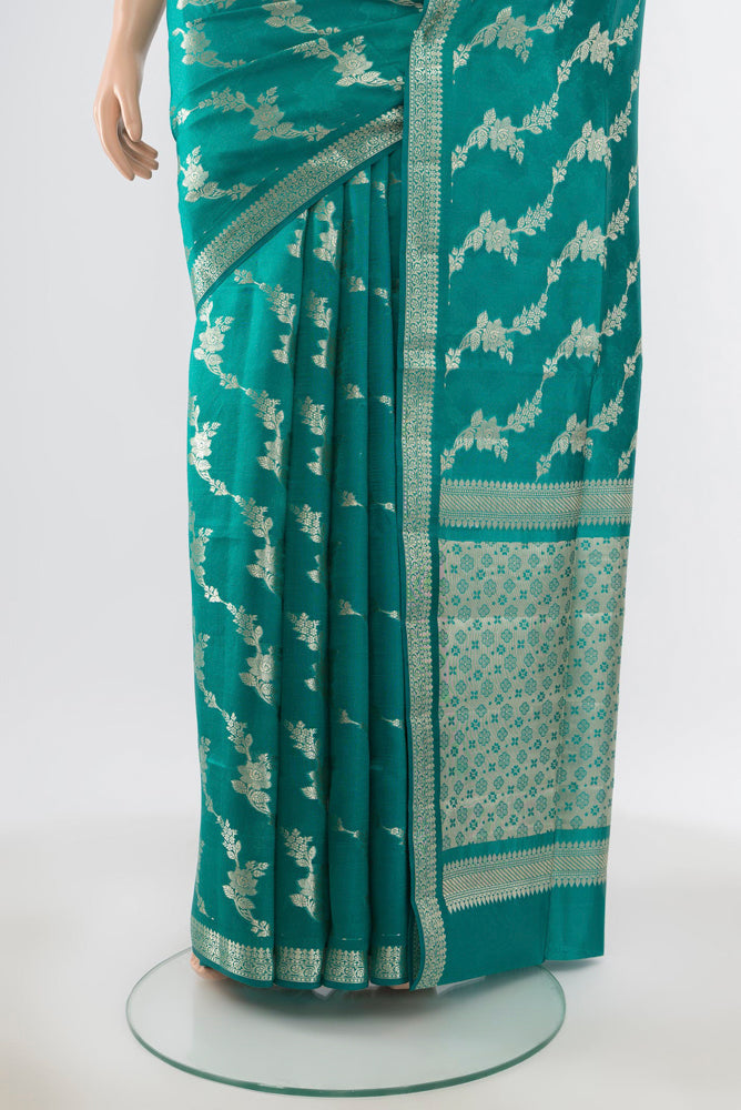 Pleats and pallu of Pure Silk Pure Zari Dark Mauve Banarasi Raw Saree with Zari Butta on the body and Silk Border. 