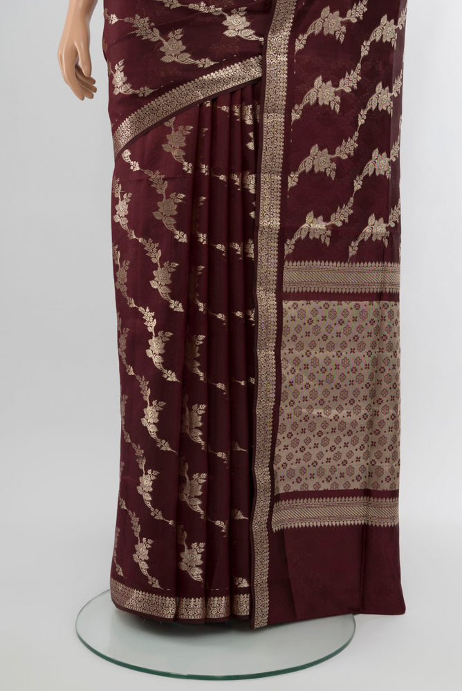 Pleats and pallu of Coffee Brown Banarasi Raw Silk Saree with Zari Butta on the body and Silk Border. 