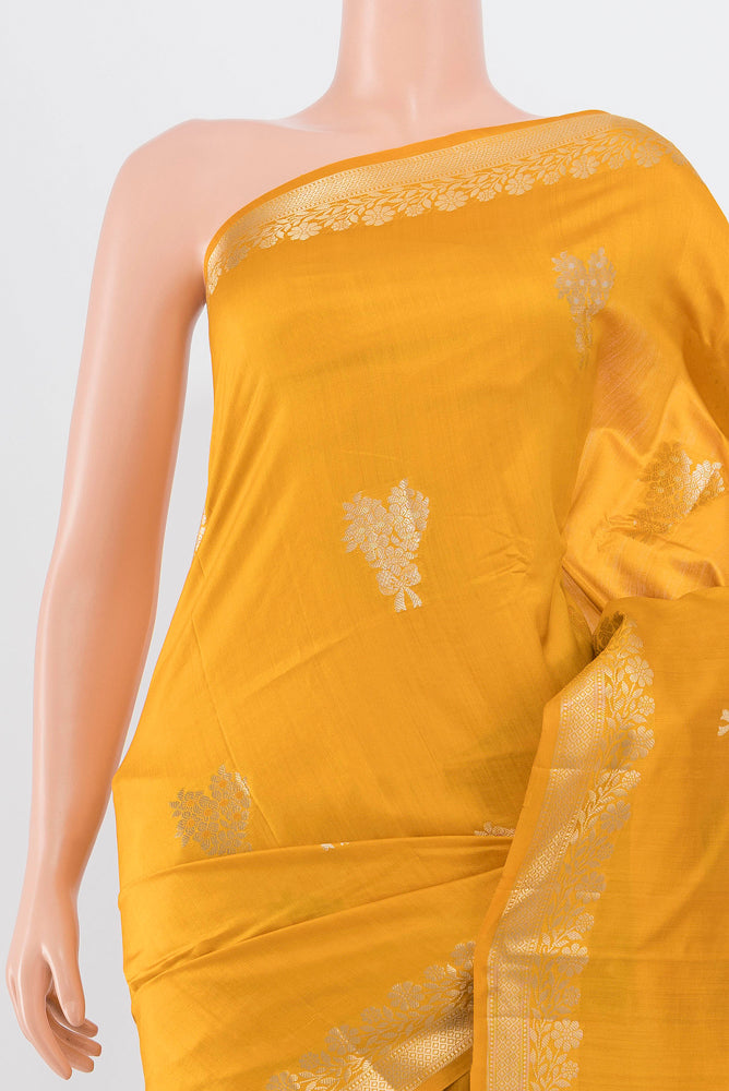 Border image of Yellow Banarasi Katan Silk Saree with Zari Butta on the body and Silk Border. 