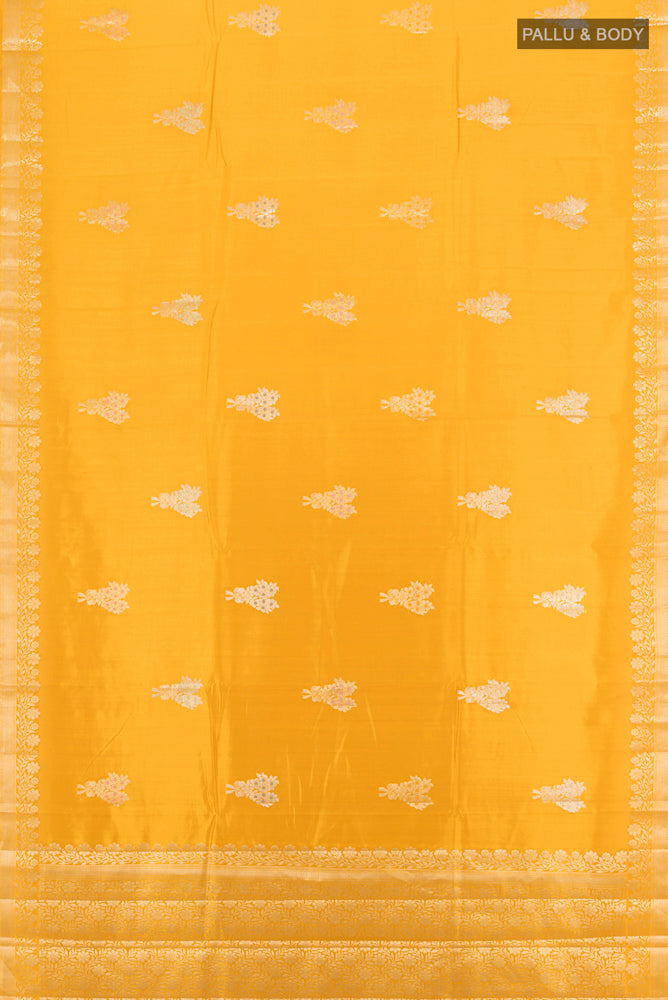 Flat view of Yellow Banarasi Katan Silk Saree with Zari Butta on the body and Silk Border. 