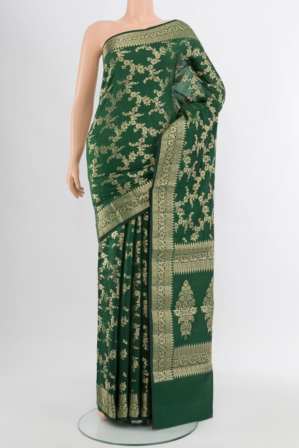 Mint Green Banarasi Raw Silk Saree with Zari Butta on the body and Silk Border.  displayed on a mannequin