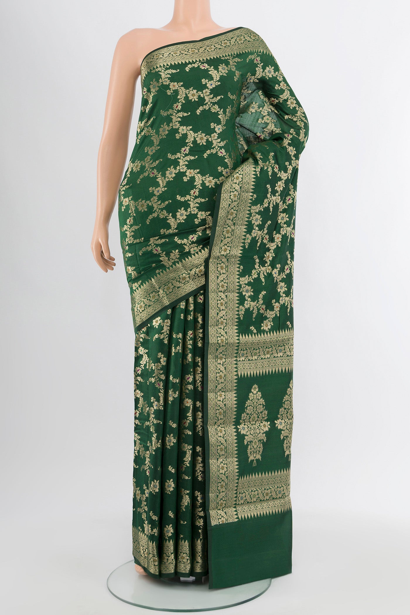 Mint Green Banarasi Raw Silk Saree with Zari Butta on the body and Silk Border.  displayed on a mannequin