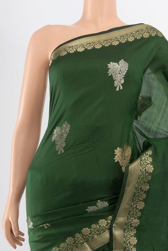 Border image of Pure Silk Pure Zari Bottle Green Banarasi Raw Saree with Zari Butta on the body and Silk Border. 