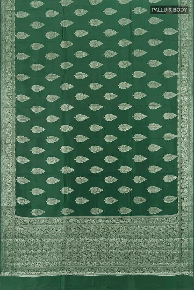 Flat view of Mint Green Banarasi Raw Silk Saree with Zari Butta on the body and Silk Border. 