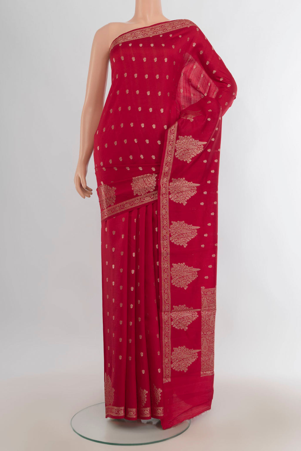 Pure Silk Maroon Banarasi Raw Saree with Zari Butta on the body and Silk Border.  displayed on a mannequin
