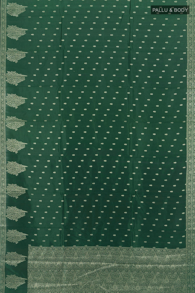 Flat view of Mint Green Tussar Saree with Zari Butta on the body and Silk Border. 