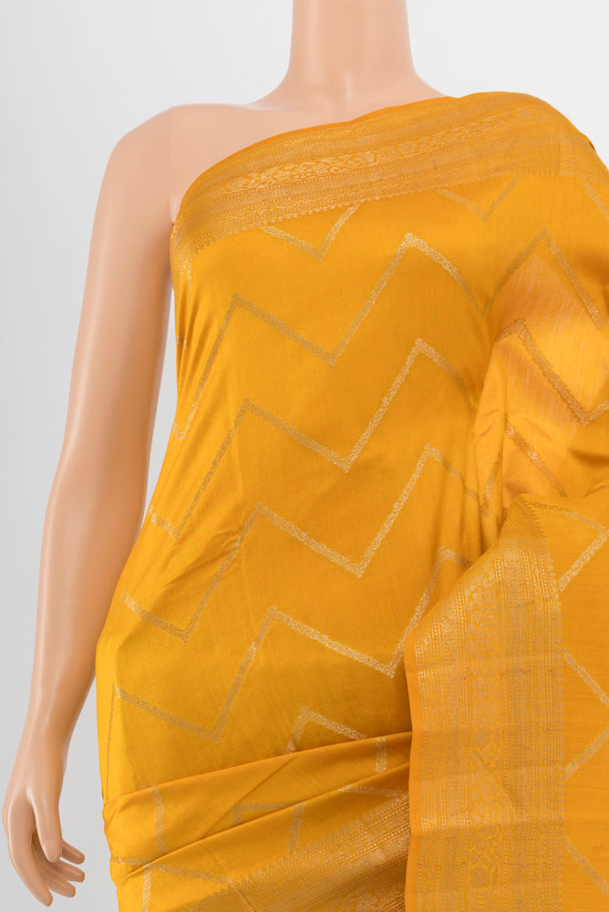 Border image of Yellow Tussar Silk Saree with Zari Brocade on the body and Silk Border. 